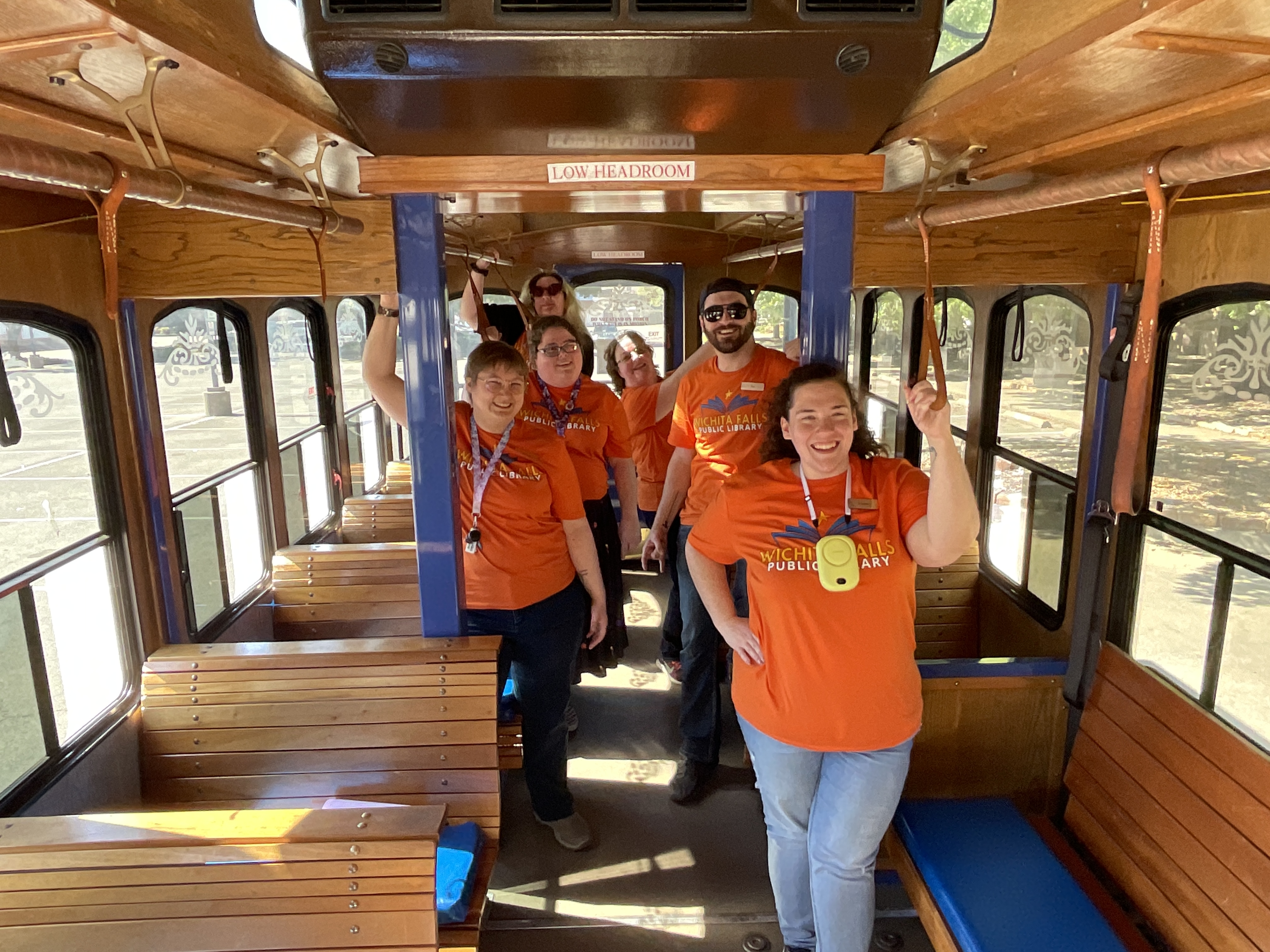 Library staff members on the trolley